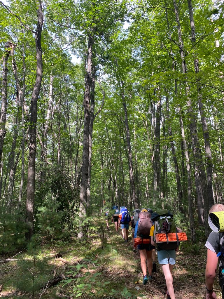 Action-shot from backpacking portion of Go-Rec LandSea.