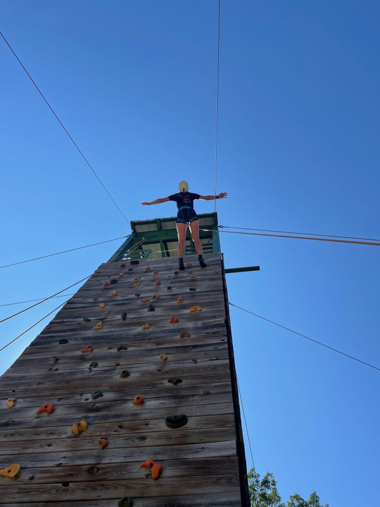 Rock Climber getting lowered. 