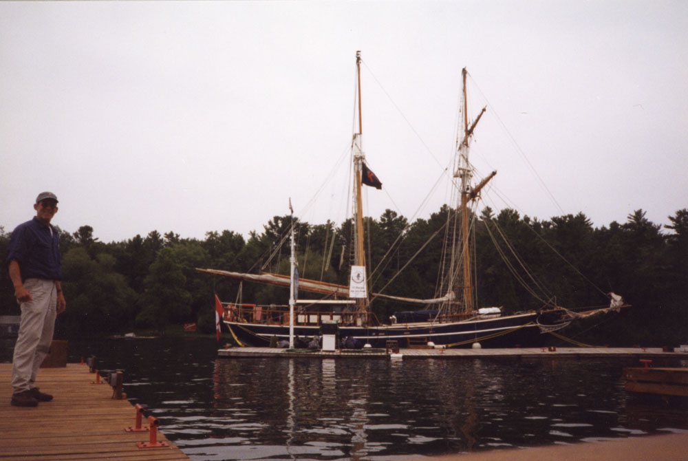 The sailboat flies a Kalamazoo College flag.