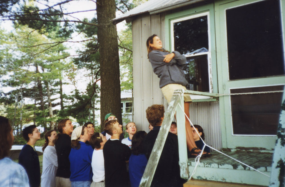 Leaders do some final trust falls in preparation for the participants.